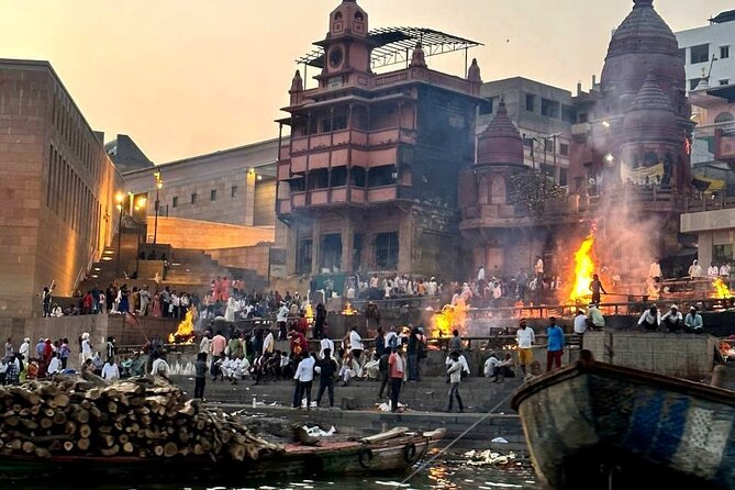 Delhi to Varanasi: Tour to the Sacred Ganga Aarti Ceremony - A respectful look at Manikarnika Ghat