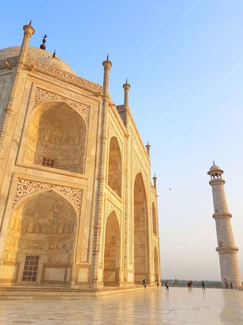From Delhi: Taj Mahal & Agra Fort Luxury Tour with 5<em> Lunch – The Delhi to Agra road trip’ /></p>
<p><p>This experience begins with pickup from Delhi, New Delhi, Noida, or Gurgaon. You travel in a private luxury car or SUV with a chauffeur, and the price includes fuel, tolls, parking, taxes, water, and soft drinks.</p>
</p>
<p><p>That matters because the Delhi to Agra route is not a simple hop. One French-speaking customer reported spending more than eight hours with the driver because traffic made the journey much longer than the nominal travel time. Another passenger arrived 90 minutes late after a delayed flight and found the driver still waiting.</p>
</p>
<p><p>I would plan this as a full-day outing, even though the advertised duration ranges from four to ten hours. The short end may be possible in favorable conditions, but the longer estimate is the safer one for planning flights, trains, or evening reservations.</p>
</p>
<p><p>Your driver is separate from your guide, which is useful. The driver handles the roads and parking while your guide takes over at the monuments. Drivers praised in the feedback include Kapil and Sam, both noted for patience, careful driving, and helpful service.</p>
</p>
<p><p>The private format also lets you return to Delhi or finish in Agra. Pickup and drop-off options include Delhi, New Delhi, and Agra, so the trip can work for a Delhi base or for an onward stay in Agra.</p>
</p>
<div class="twil" style="margin: 20px 0; padding: 15px 0;"><p>More Agra Fort tours:</p><ul style="margin: 10px 0; padding-left: 0; list-style: none;"><li style="margin: 0 0 12px 0; padding: 0 0 12px 0; border-bottom: 1px solid #F4E3E0; line-height: 1.4;"><a href="https://newdelhiadventures.com/same-day-taj-mahal-agra-fort-baby-taj-tour-from-delhi-by-car/">Same Day Taj Mahal, Agra Fort & Baby Taj Tour from Delhi by Car</a><br><span style="font-size: 0.82em; color: #555;"><span style="color: #F5A31A;">★</span> 5.0 &nbsp;&middot;&nbsp; 4,304 reviews</span></li><li style="margin: 0 0 12px 0; padding: 0 0 12px 0; border-bottom: 1px solid #F4E3E0; line-height: 1.4;"><a href="https://newdelhiadventures.com/full-day-taj-mahal-agra-fort-baby-taj-tour-from-delhi-by-car/">Full Day Taj Mahal, Agra Fort & Baby Taj Tour from Delhi by Car</a><br><span style="font-size: 0.82em; color: #555;"><span style="color: #F5A31A;">★</span> 5.0 &nbsp;&middot;&nbsp; 3,647 reviews</span></li><li style="margin: 0; padding: 0; border-bottom: none; line-height: 1.4;"><a href="https://newdelhiadventures.com/from-delhi-taj-mahal-and-agra-fort-private-sunrise-tour/">From Delhi: Taj Mahal and Agra Fort Private Sunrise Tour</a><br><span style="font-size: 0.82em; color: #555;"><span style="color: #F5A31A;">★</span> 4.9 &nbsp;&middot;&nbsp; 2,270 reviews</span></li></ul></div><h2>Seeing the Taj Mahal with a private guide</h2>
<p> Lunch – Seeing the Taj Mahal with a private guide’ /></p>
<p><p>The Taj Mahal receives about two hours in the planned schedule. That is enough time for the main approach, the famous front view, the gardens, and the mausoleum area, but you should not expect an unhurried morning spent studying every detail.</p>
</p>
<p><p>VIP skip-the-line entry is included. That is one of the most useful parts of the arrangement, since entrance procedures and queues can eat into a tightly planned day. Your guide meets you for the visit and explains the building, its purpose, and the details that are easy to miss when you are focused on getting the perfect photograph.</p>
</p>
<p><p>Farman guided one French-speaking visitor and helped explain both the Taj Mahal and Agra Fort. Cozi has also guided the visit in a calm, friendly way, while Deepack was praised for fluent English, local knowledge, and taking patient photographs. Guide quality can shape the whole day, and these named examples suggest that language support and personal attention are central to the experience.</p>
</p>
<p><p>The Taj Mahal is a mausoleum built by Mughal emperor Shah Jahan for Mumtaz Mahal. You do not need a long lecture to appreciate it, but a good guide helps connect the marble, symmetry, gardens, and stone inlay to the building’s purpose.</p>
</p>
<p><p>Allow time for security and for walking between areas, even with priority access. Wear comfortable shoes and comfortable clothes, as requested for the outing. Drones are not allowed.</p>
</p>
<p><p>The Taj Mahal is closed on Fridays. This is the most important calendar check before booking. If Friday is your only available day, this particular plan will not work as described.</p>
</p>
<h2>Lunch at the DoubleTree by Hilton</h2>
<p><img width="825" height="650" decoding="async" src=