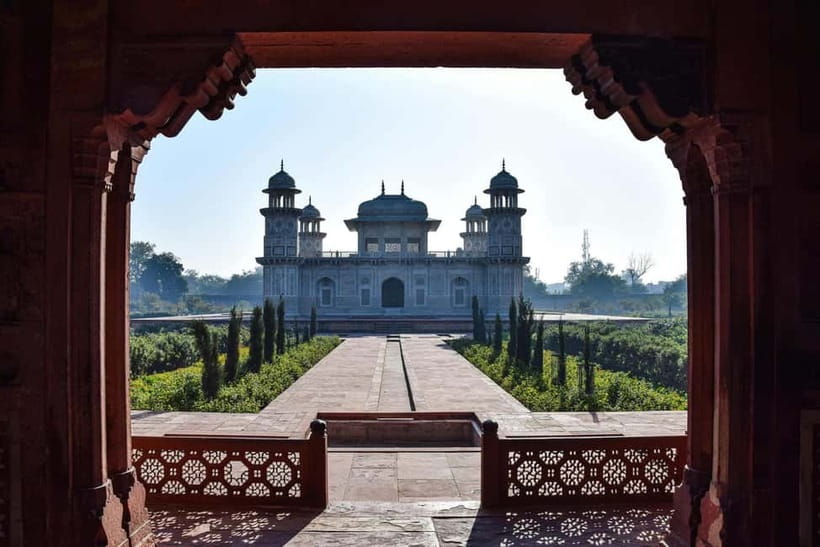 From Delhi: Taj Mahal, Agra Fort, Mehtab Bagh Tour & 5<em>Lunch – Sunrise at the Taj Mahal before the crowds’ /></p>
<p><p>The whole day is built around one big moment: reaching the Taj Mahal early enough to see its marble change with the morning light. The monument can look almost gray or soft pink at first, then grow brighter as the sun rises. That gradual change is one reason the early alarm is worth considering.</p>
</p>
<p><p>For the sunrise option, pickup is listed at 2:00 or 3:00 AM. That is not a typo. Delhi and Agra are far enough apart to make this a long road journey, followed by several hours on your feet. You should expect an 8 to 12-hour day overall, depending on your pickup point, traffic, and time spent at each site.</p>
</p>
<p><p>Your driver collects you from a chosen location in Delhi, New Delhi, Noida, Gurugram, or Aerocity. Agra is also offered as a pickup and drop-off point, which makes the trip useful if you are already staying there rather than beginning in Delhi.</p>
</p>
<p><p>A private vehicle matters here. You do not have to coordinate with a large group or wait for people at several hotels. You can also keep your own small items in the car between stops. The vehicle is air-conditioned, an important comfort in Agra, where the temperature can make outdoor sightseeing tiring.</p>
</p>
<div class="twil" style="margin: 20px 0; padding: 15px 0;"><p>More Baby Taj and Mehtab Bagh stops:</p><ul style="margin: 10px 0; padding-left: 0; list-style: none;"><li style="margin: 0 0 12px 0; padding: 0 0 12px 0; border-bottom: 1px solid #F4E3E0; line-height: 1.4;"><a href="https://newdelhiadventures.com/same-day-taj-mahal-agra-fort-baby-taj-tour-from-delhi-by-car/">Same Day Taj Mahal, Agra Fort & Baby Taj Tour from Delhi by Car</a><br><span style="font-size: 0.82em; color: #555;"><span style="color: #F5A31A;">★</span> 5.0 &nbsp;&middot;&nbsp; 4,304 reviews</span></li><li style="margin: 0 0 12px 0; padding: 0 0 12px 0; border-bottom: 1px solid #F4E3E0; line-height: 1.4;"><a href="https://newdelhiadventures.com/full-day-taj-mahal-agra-fort-baby-taj-tour-from-delhi-by-car/">Full Day Taj Mahal, Agra Fort & Baby Taj Tour from Delhi by Car</a><br><span style="font-size: 0.82em; color: #555;"><span style="color: #F5A31A;">★</span> 5.0 &nbsp;&middot;&nbsp; 3,647 reviews</span></li><li style="margin: 0; padding: 0; border-bottom: none; line-height: 1.4;"><a href="https://newdelhiadventures.com/same-day-taj-mahal-fort-baby-taj-tour-from-delhi-by-car/">Same Day Taj Mahal, Fort & Baby Taj Tour from Delhi by Car</a><br><span style="font-size: 0.82em; color: #555;"><span style="color: #F5A31A;">★</span> 4.9 &nbsp;&middot;&nbsp; 2,534 reviews</span></li></ul></div><h2>Entering the Taj Mahal at the quietest useful hour</h2>
<p><img width="820" height="547" decoding="async" src=