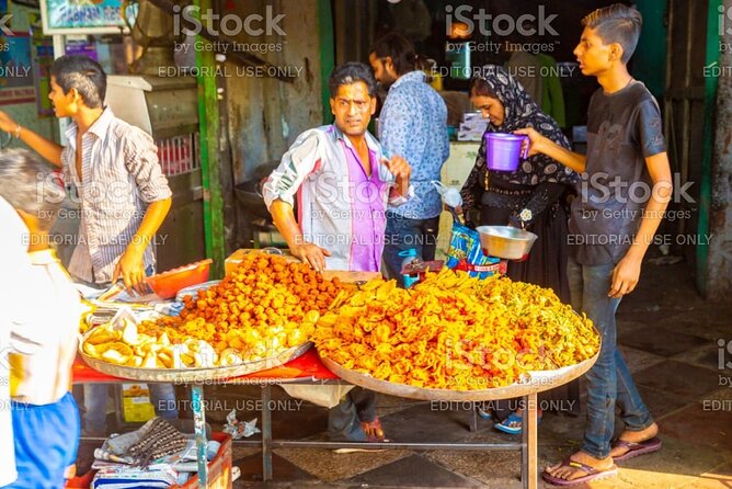 Old Delhi Cultural, Temples, Heritage Walking Street Food Tour - Naughara offers a calmer architectural lane