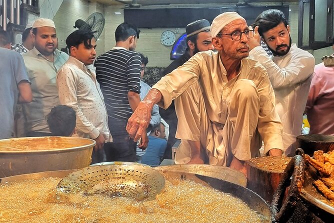 Old Delhi Night Food Tour - Kitchens & Local Stories - Jama Masjid lanes bring out the grill
