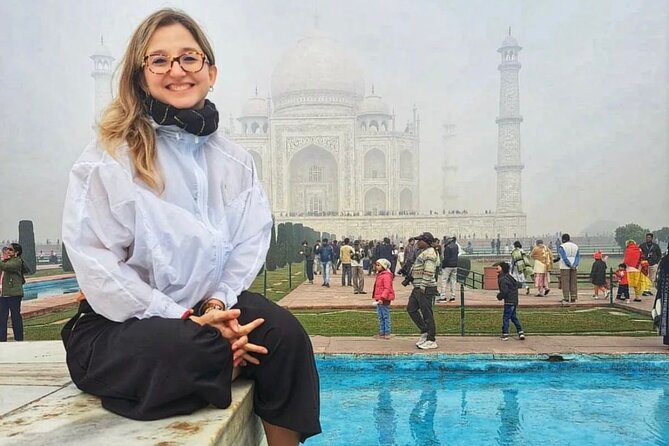Taj Mahal, Agra Fort & Baby Taj Tour from Delhi with Meal - Reading Agra Fort beyond the red walls